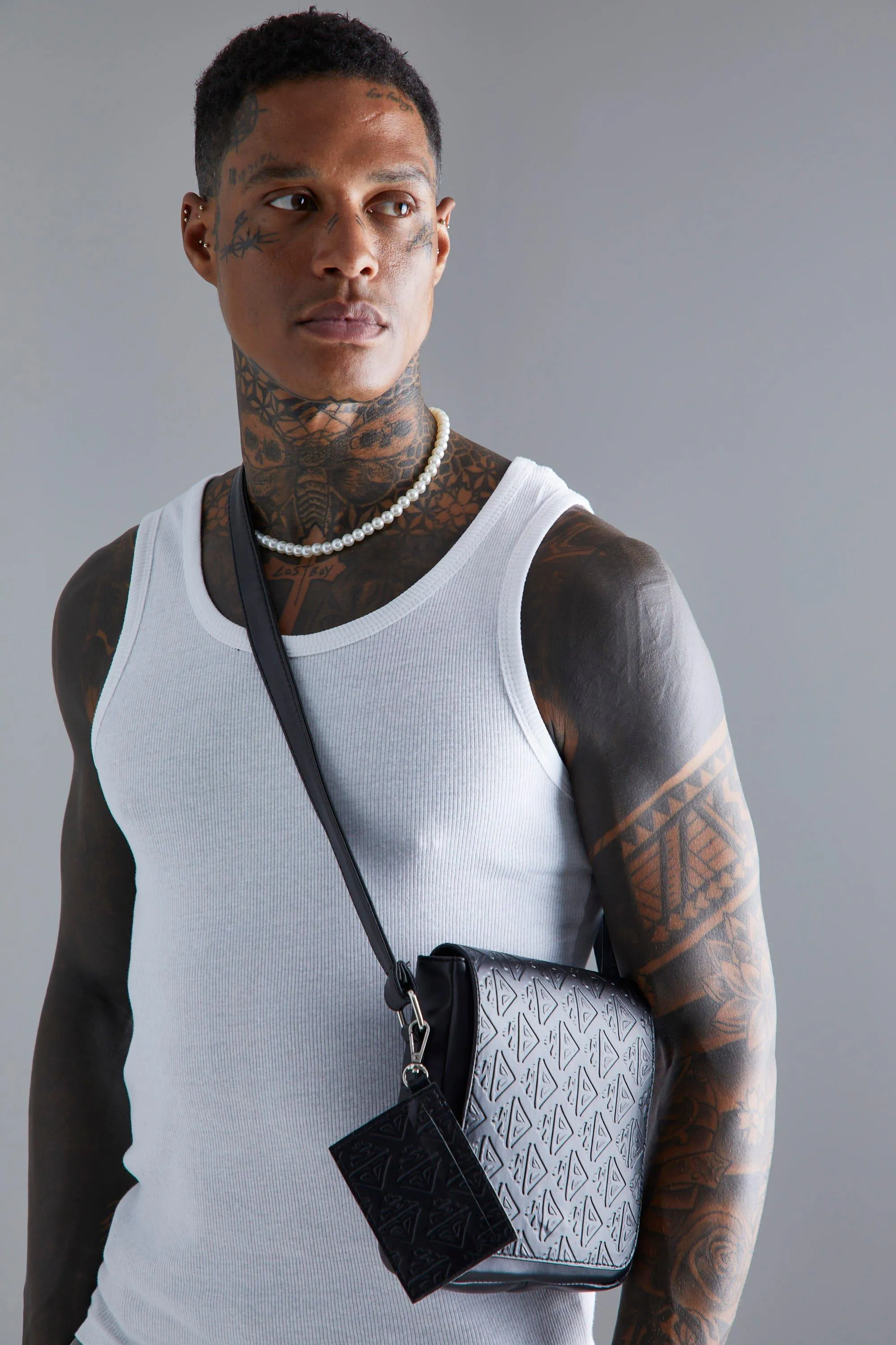 Debossed Flap Cross Body Bag | boohooMAN UK